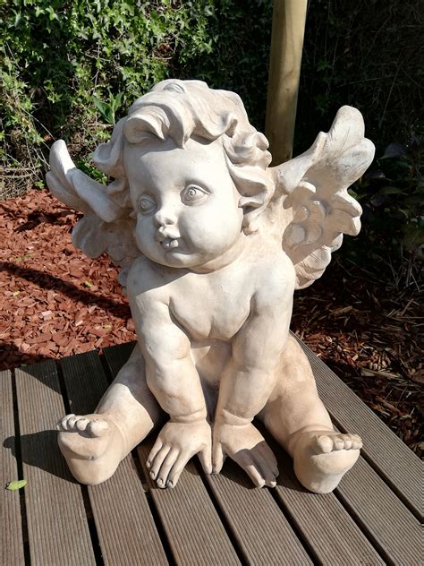 garden cherub sculptures